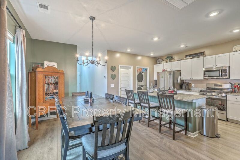 Like-New Pond Lot Home with First-Floor Primary Suite property image