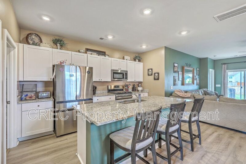 Like-New Pond Lot Home with First-Floor Primary Suite property image