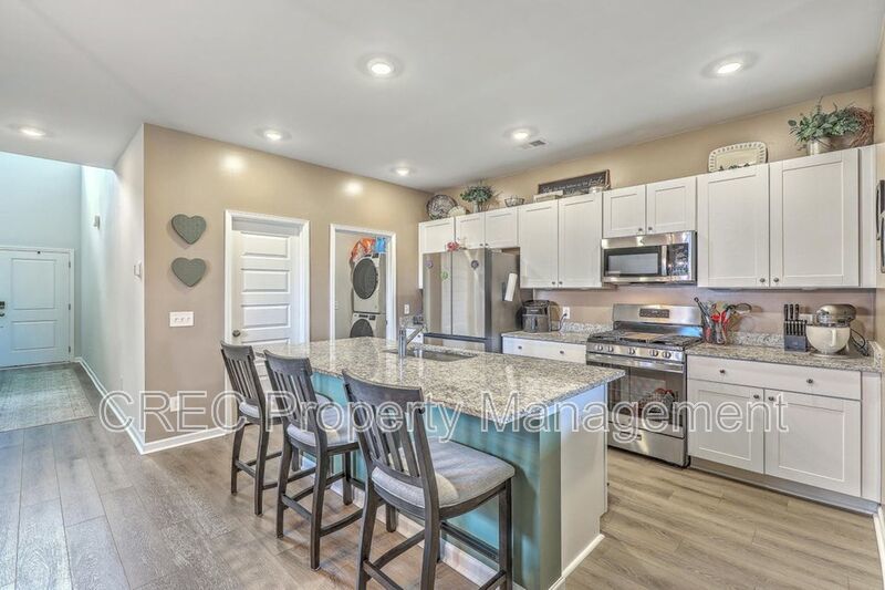 Like-New Pond Lot Home with First-Floor Primary Suite property image