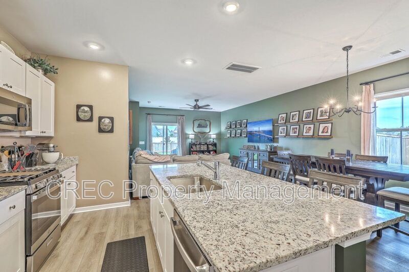 Like-New Pond Lot Home with First-Floor Primary Suite property image