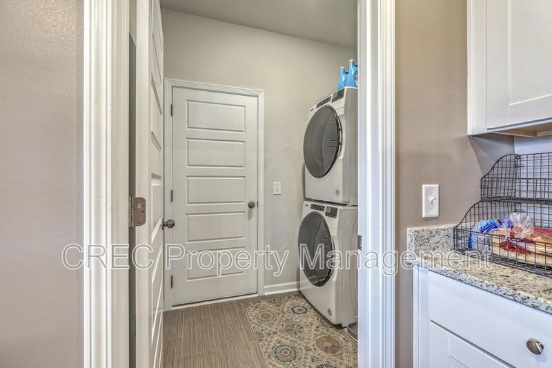 Like-New Pond Lot Home with First-Floor Primary Suite property image