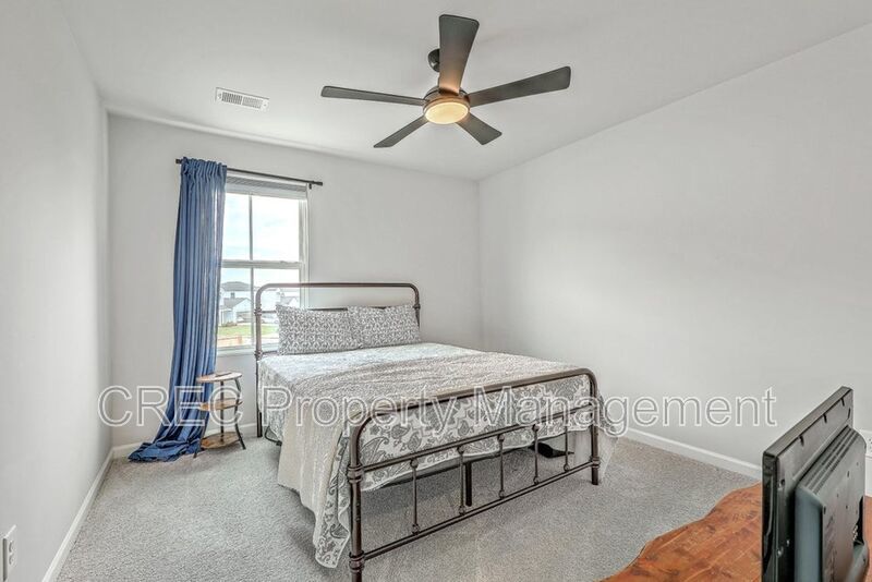 Like-New Pond Lot Home with First-Floor Primary Suite property image