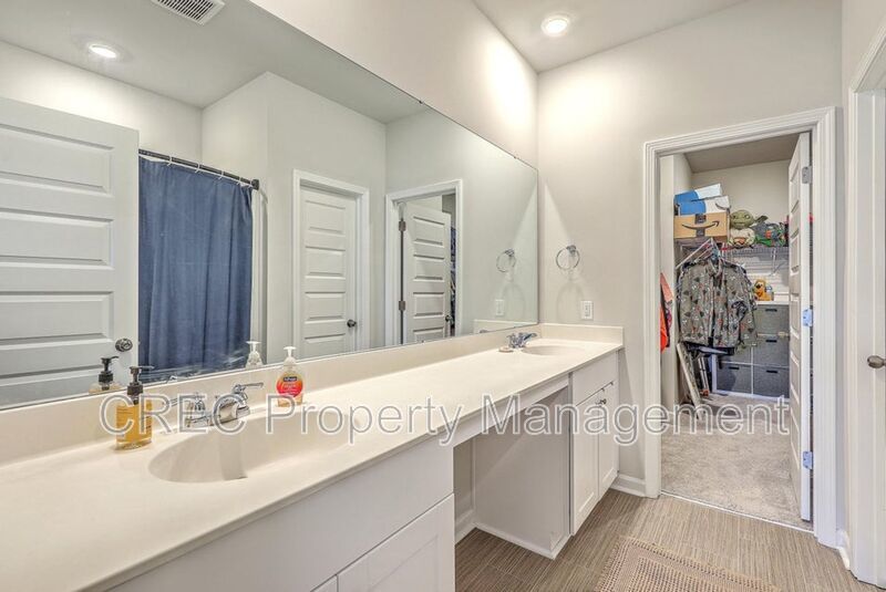 Like-New Pond Lot Home with First-Floor Primary Suite property image