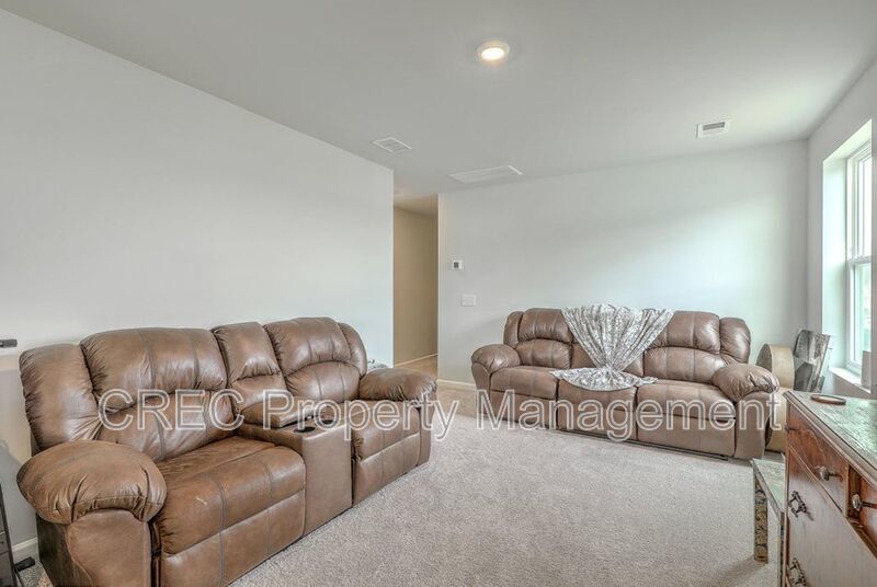 Like-New Pond Lot Home with First-Floor Primary Suite property image