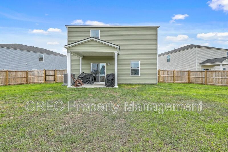 Like-New Pond Lot Home with First-Floor Primary Suite property image