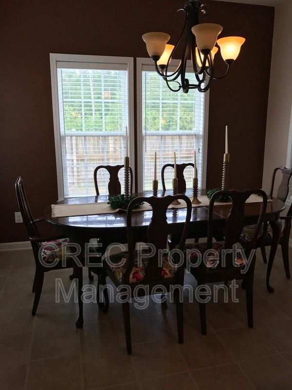 Beautiful ranch style home sitting on a quiet street property image