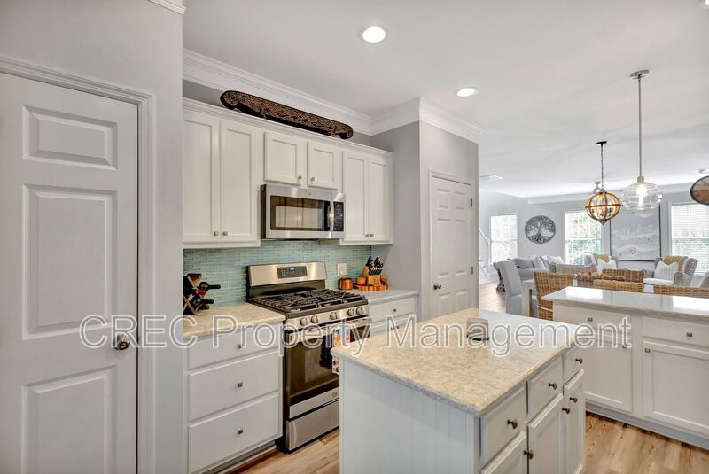 Luxury End-Unit Townhome in Gated Dunes West with Bonus Suite property image