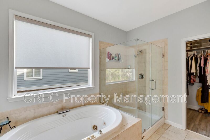 Luxury End-Unit Townhome in Gated Dunes West with Bonus Suite property image