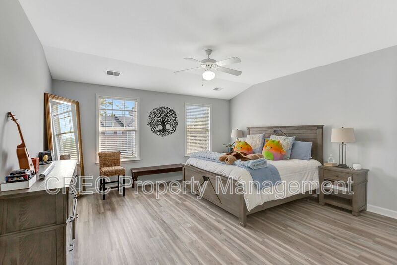 Luxury End-Unit Townhome in Gated Dunes West with Bonus Suite property image