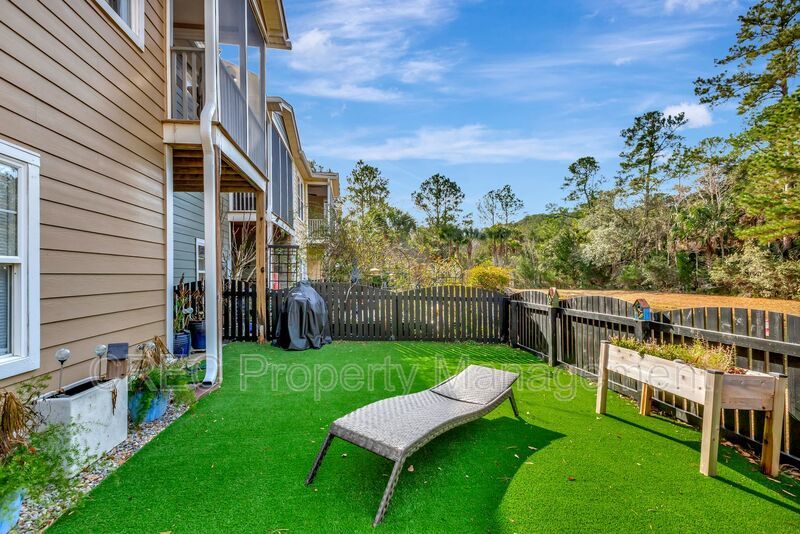 Luxury End-Unit Townhome in Gated Dunes West with Bonus Suite property image