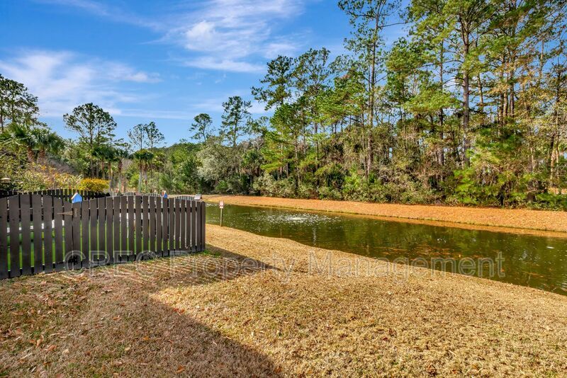 Luxury End-Unit Townhome in Gated Dunes West with Bonus Suite property image