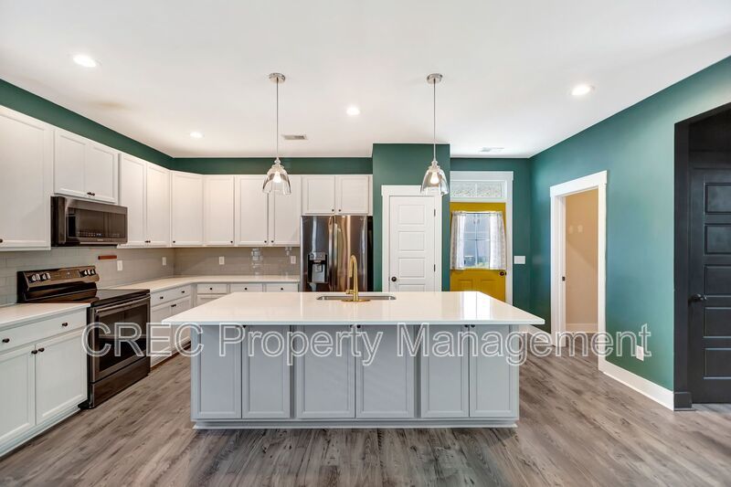 Hidden Gem in Greater Park Circle – End-Unit Cottage Living with Master Down & Park Views property image