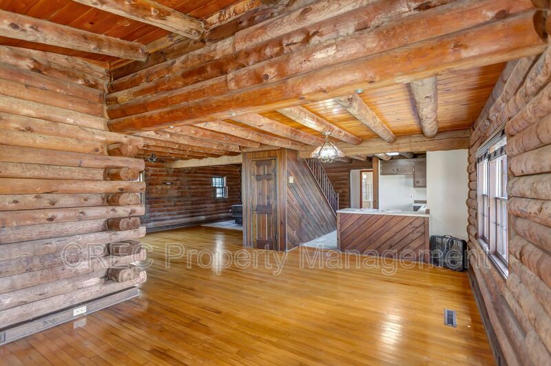 Whispering Pines Log Cabin Retreat – Rustic Charm on Wooded Acreage property image