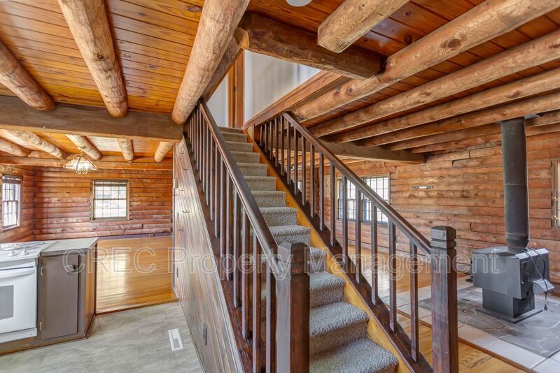 Whispering Pines Log Cabin Retreat – Rustic Charm on Wooded Acreage property image