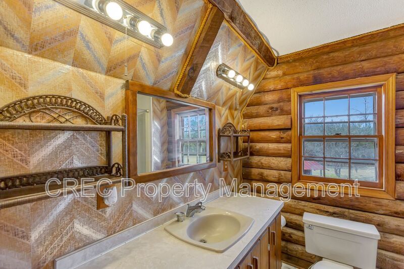 Whispering Pines Log Cabin Retreat – Rustic Charm on Wooded Acreage property image