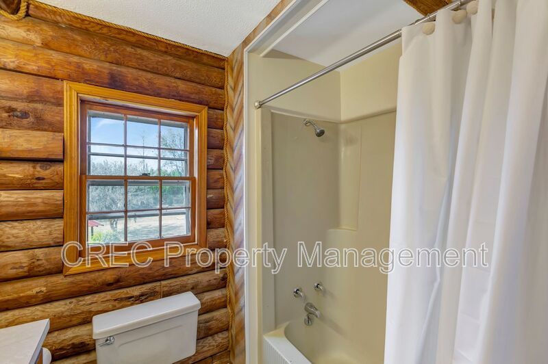 Whispering Pines Log Cabin Retreat – Rustic Charm on Wooded Acreage property image