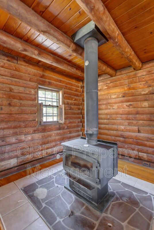 Whispering Pines Log Cabin Retreat – Rustic Charm on Wooded Acreage property image