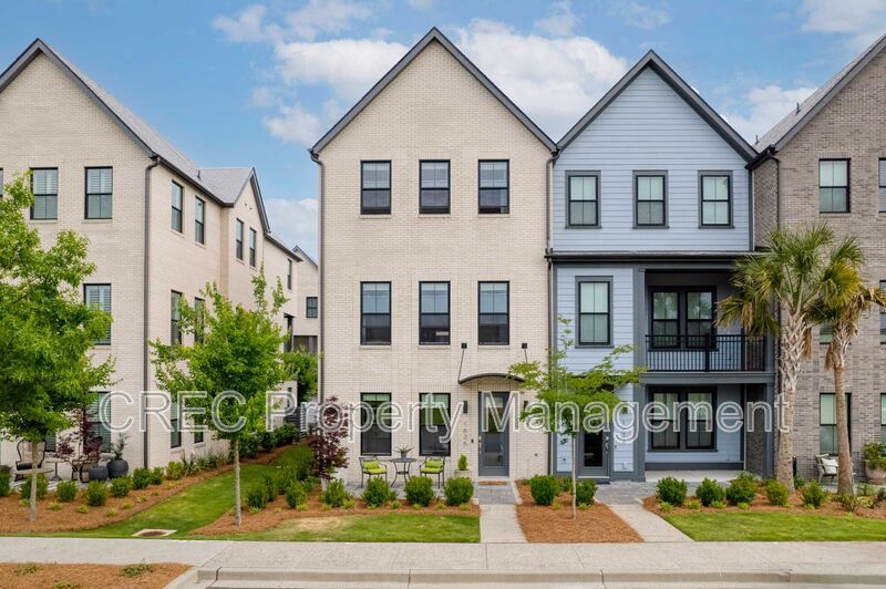 NEW PRICE & FREE MONTH OF RENT! Luxurious End-Unit Townhome with Elevator & Gourmet Kitchen – 4 Beds, 3.5 Baths, Prime Location! property image
