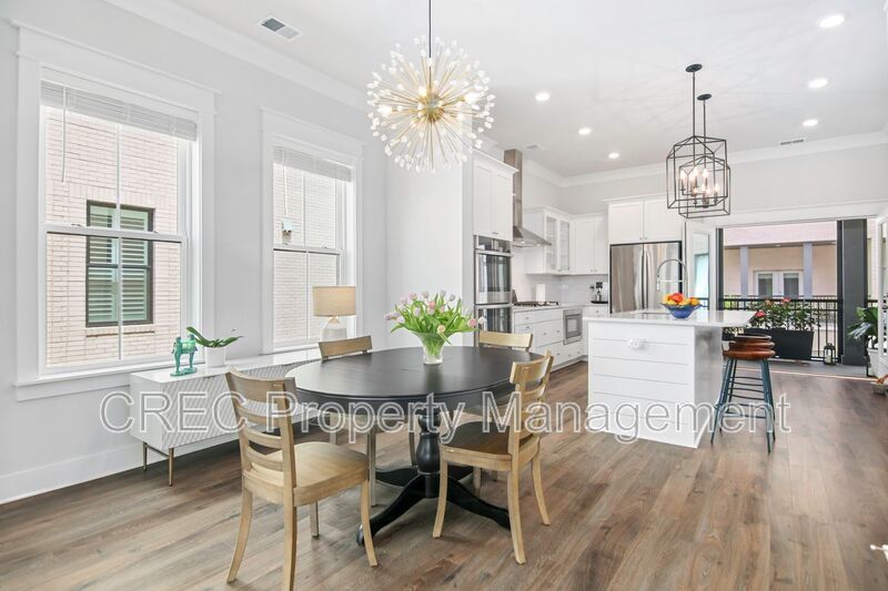 NEW PRICE & FREE MONTH OF RENT! Luxurious End-Unit Townhome with Elevator & Gourmet Kitchen – 4 Beds, 3.5 Baths, Prime Location! property image