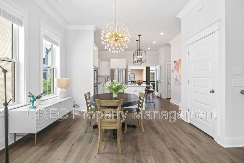 NEW PRICE & FREE MONTH OF RENT! Luxurious End-Unit Townhome with Elevator & Gourmet Kitchen – 4 Beds, 3.5 Baths, Prime Location! property image