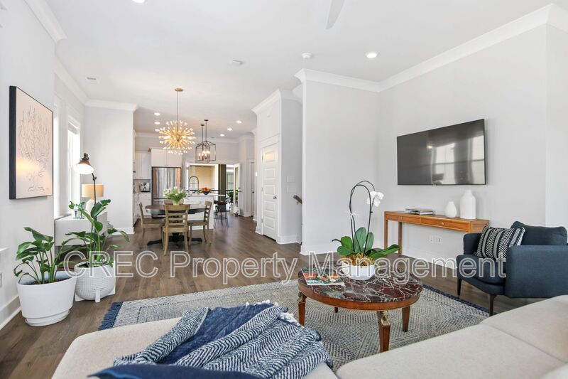 NEW PRICE & FREE MONTH OF RENT! Luxurious End-Unit Townhome with Elevator & Gourmet Kitchen – 4 Beds, 3.5 Baths, Prime Location! property image