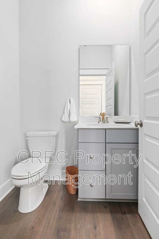 NEW PRICE & FREE MONTH OF RENT! Luxurious End-Unit Townhome with Elevator & Gourmet Kitchen – 4 Beds, 3.5 Baths, Prime Location! property image