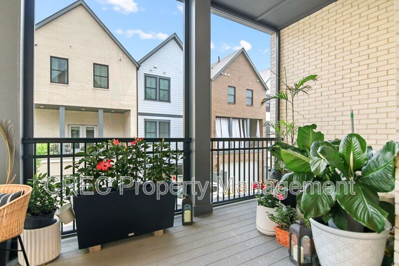 NEW PRICE & FREE MONTH OF RENT! Luxurious End-Unit Townhome with Elevator & Gourmet Kitchen – 4 Beds, 3.5 Baths, Prime Location! property image