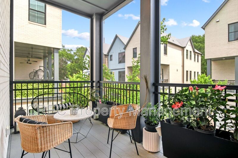 NEW PRICE & FREE MONTH OF RENT! Luxurious End-Unit Townhome with Elevator & Gourmet Kitchen – 4 Beds, 3.5 Baths, Prime Location! property image