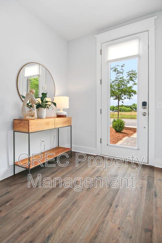NEW PRICE & FREE MONTH OF RENT! Luxurious End-Unit Townhome with Elevator & Gourmet Kitchen – 4 Beds, 3.5 Baths, Prime Location! property image