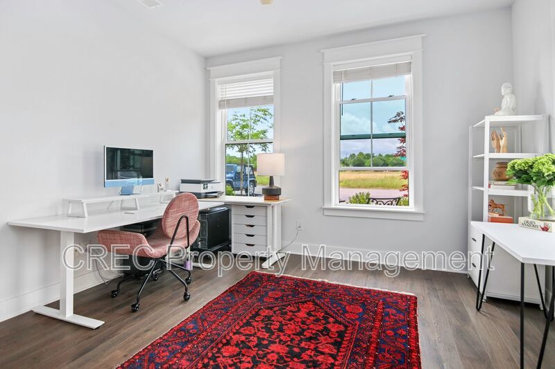 NEW PRICE & FREE MONTH OF RENT! Luxurious End-Unit Townhome with Elevator & Gourmet Kitchen – 4 Beds, 3.5 Baths, Prime Location! property image