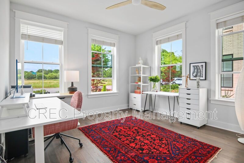 NEW PRICE & FREE MONTH OF RENT! Luxurious End-Unit Townhome with Elevator & Gourmet Kitchen – 4 Beds, 3.5 Baths, Prime Location! property image