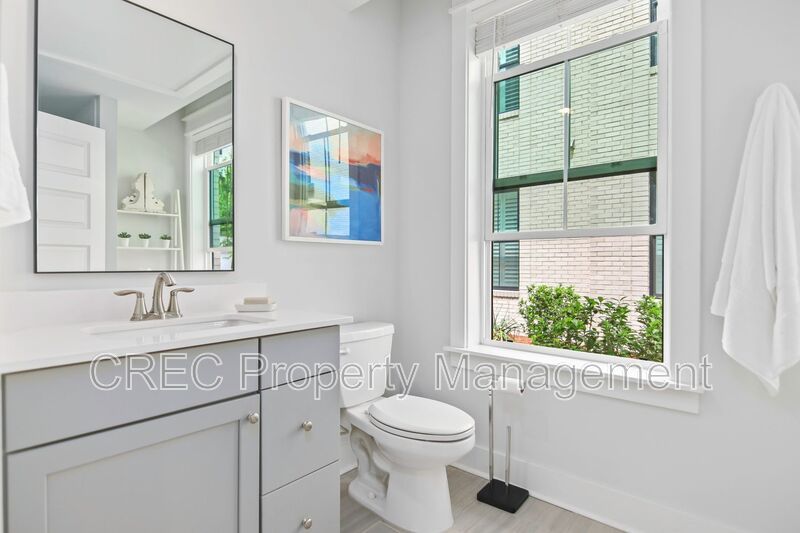 NEW PRICE & FREE MONTH OF RENT! Luxurious End-Unit Townhome with Elevator & Gourmet Kitchen – 4 Beds, 3.5 Baths, Prime Location! property image