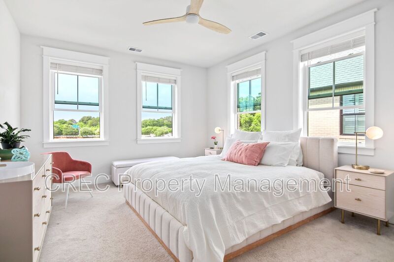 NEW PRICE & FREE MONTH OF RENT! Luxurious End-Unit Townhome with Elevator & Gourmet Kitchen – 4 Beds, 3.5 Baths, Prime Location! property image