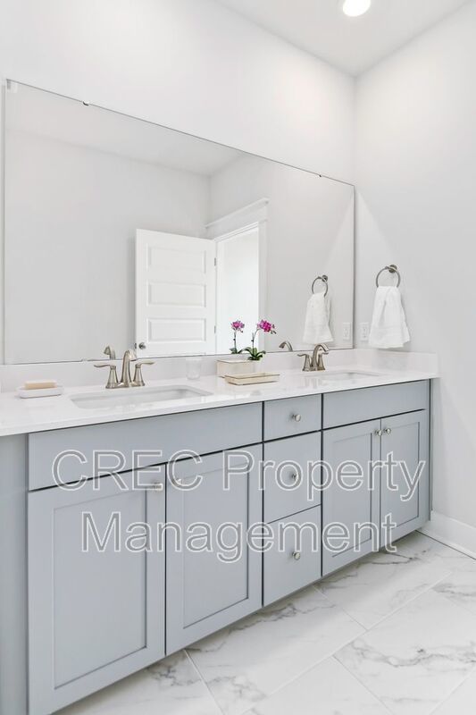 NEW PRICE & FREE MONTH OF RENT! Luxurious End-Unit Townhome with Elevator & Gourmet Kitchen – 4 Beds, 3.5 Baths, Prime Location! property image