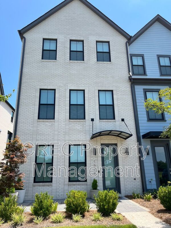 NEW PRICE & FREE MONTH OF RENT! Luxurious End-Unit Townhome with Elevator & Gourmet Kitchen – 4 Beds, 3.5 Baths, Prime Location! property image