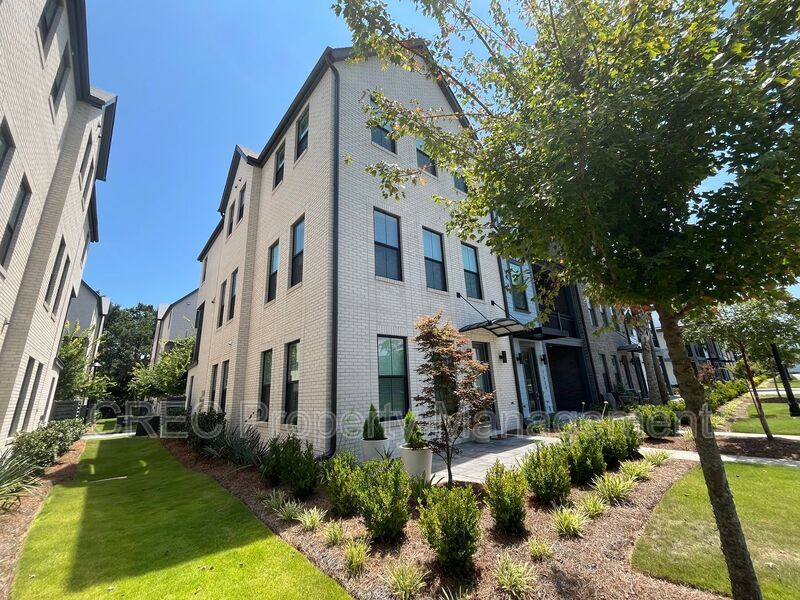 NEW PRICE & FREE MONTH OF RENT! Luxurious End-Unit Townhome with Elevator & Gourmet Kitchen – 4 Beds, 3.5 Baths, Prime Location! property image