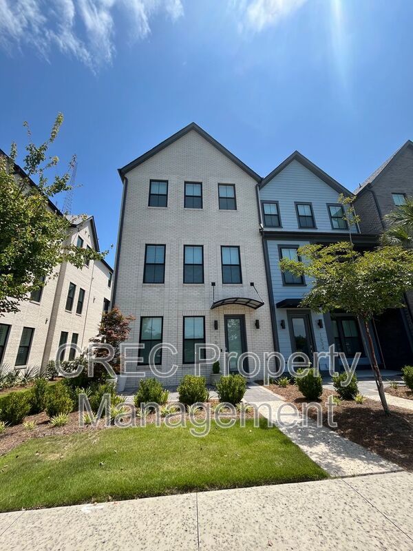 NEW PRICE & FREE MONTH OF RENT! Luxurious End-Unit Townhome with Elevator & Gourmet Kitchen – 4 Beds, 3.5 Baths, Prime Location! property image