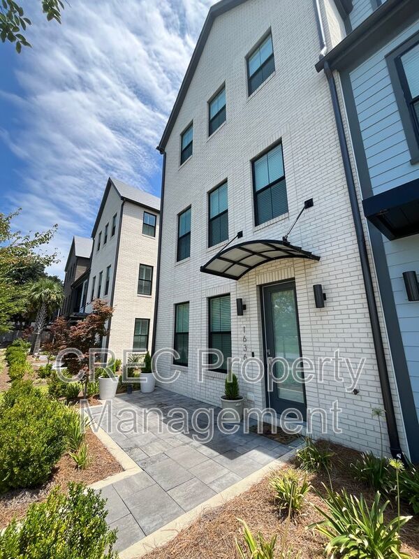 NEW PRICE & FREE MONTH OF RENT! Luxurious End-Unit Townhome with Elevator & Gourmet Kitchen – 4 Beds, 3.5 Baths, Prime Location! property image